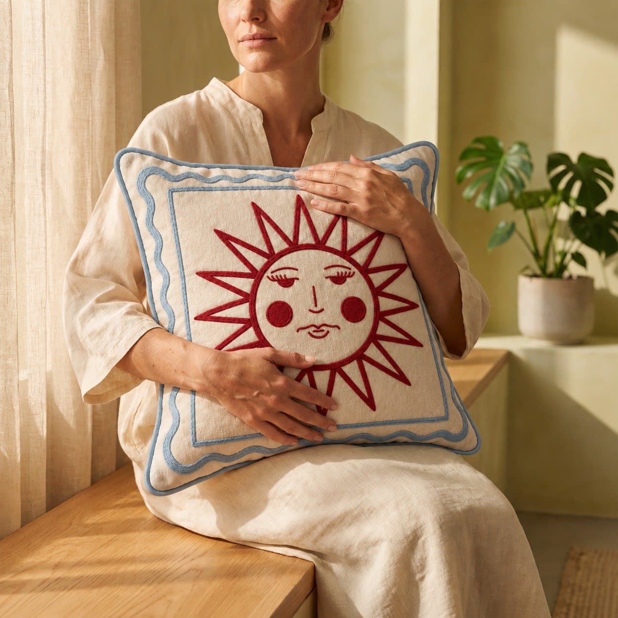 The Sunny Side Cushion held on a lap